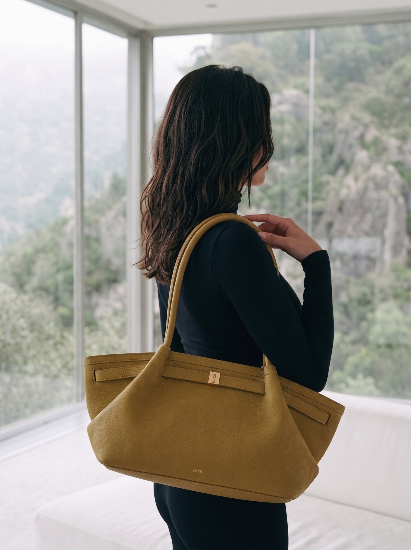 Quiet Luxury, worn over the shoulder