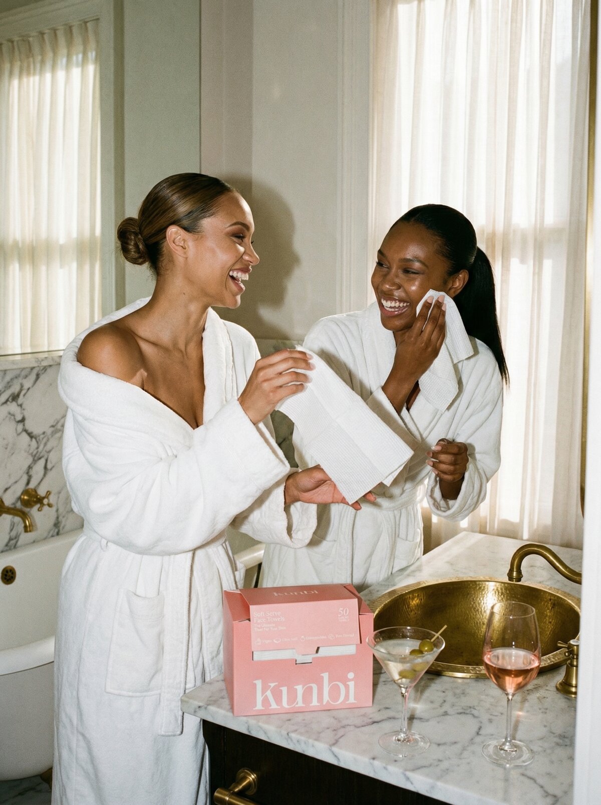 Kunbi Soft Serve, hand pulling a towel from the pink box